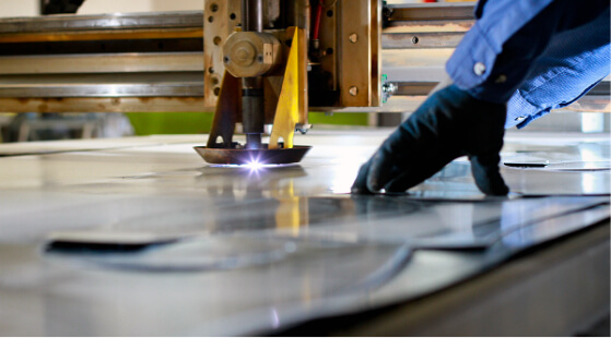 Sheet metal being cut.