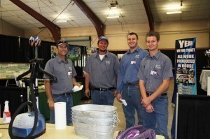 Arthur Neff_Lucas Beeler_Jacob Davidson_and Andrew Davidson setting up at the 2013 Businsess Extravaganza