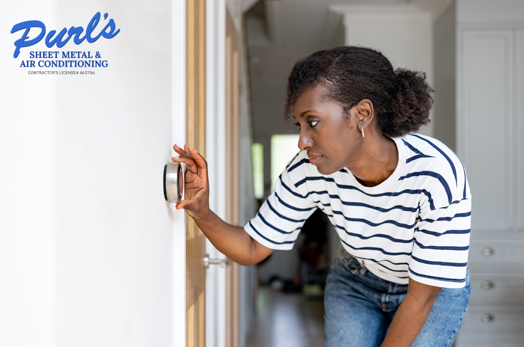 The air conditioner technician is using a gauge to measure the refrigerant pressure. air compressor.